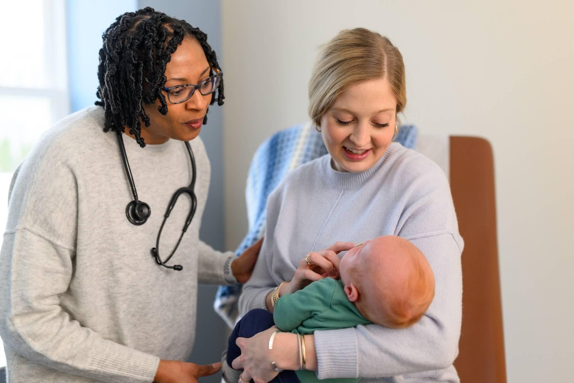 Motherwell midwife caring for a mother and her newborn